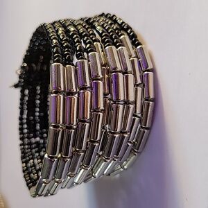 Black Seed bead and silvertone bead bracelet.
